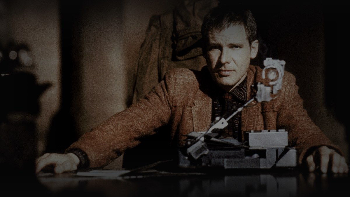 Still from Blade Runner (1982) — letterboxd (og:image, 1200x675 crop), baked through scripts/bake_dark_photo.py at factor 0.45, output brightness 30.1